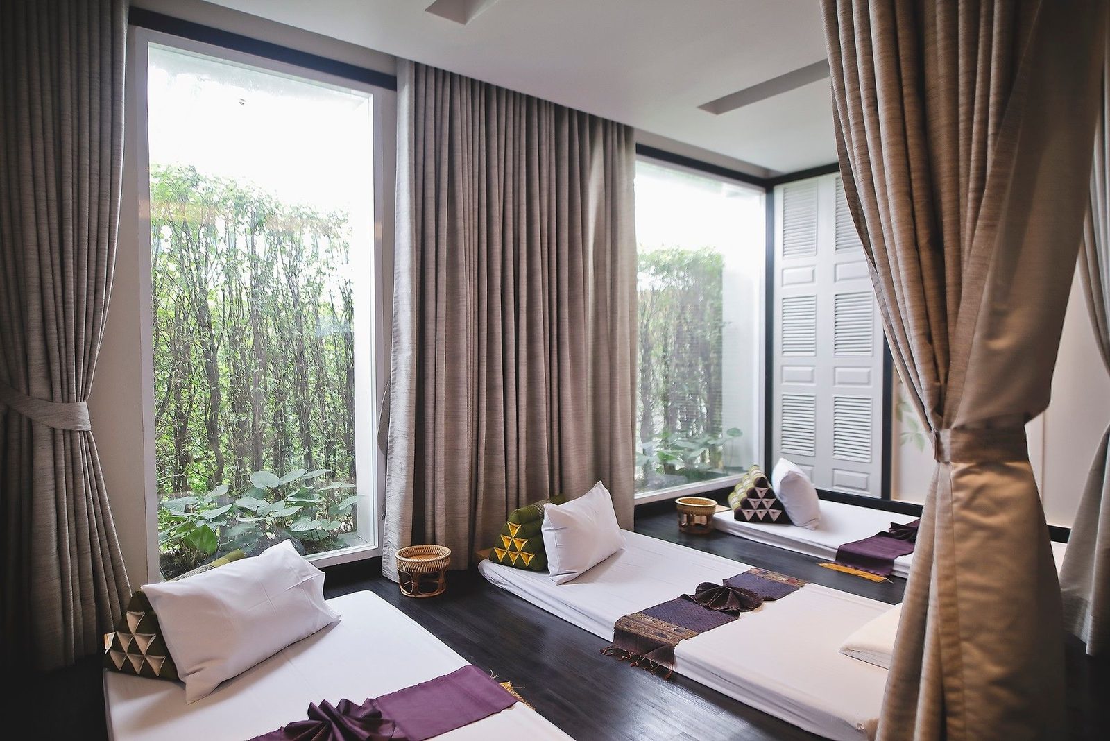 Imperial Wellness Thai massage room with garden view at The Raweekanlaya Bangkok