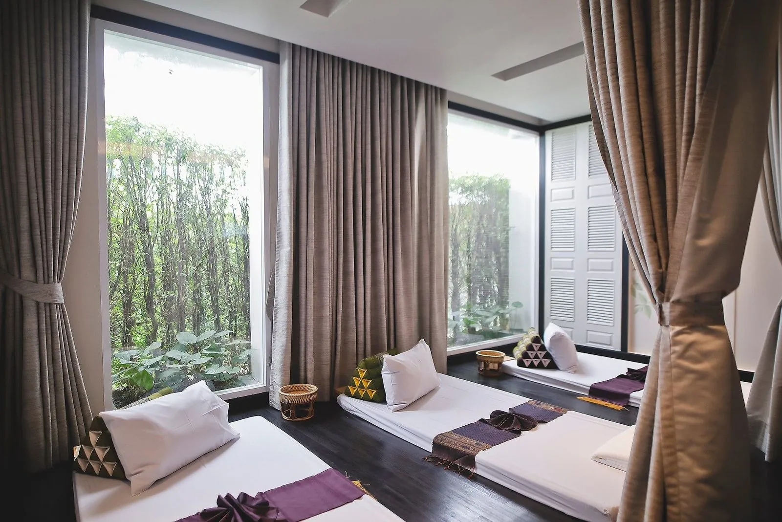 Imperial Wellness Thai massage room with garden view at The Raweekanlaya Bangkok