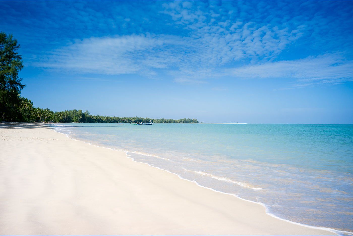 White sand beach and Andaman Sea at The Sarojin, Khao Lak
