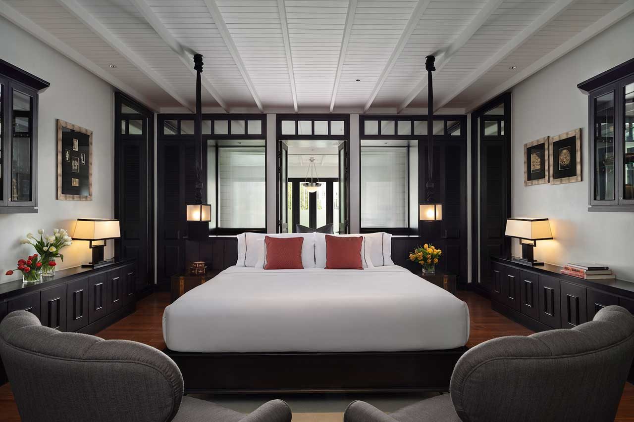 Siam Suite bedroom with king bed and Art Deco details at The Siam, Bangkok