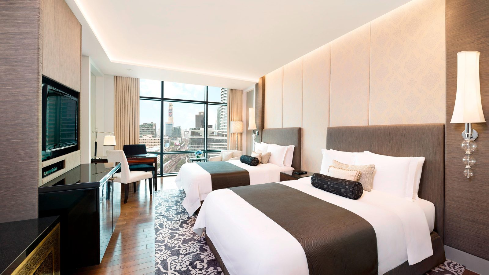 Twin guest room with city-view windows at The St. Regis Bangkok