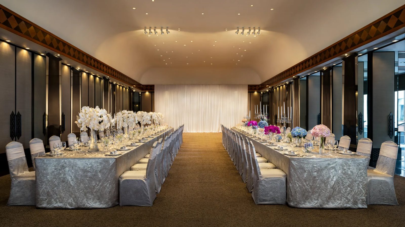 The Sukhothai Ballroom set for a long-table banquet