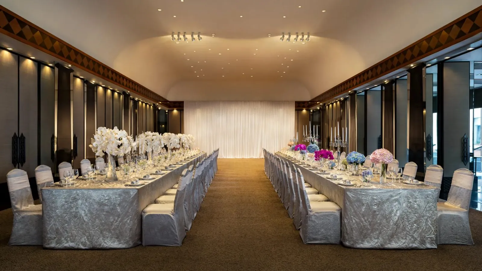The Sukhothai Ballroom set for a long-table banquet