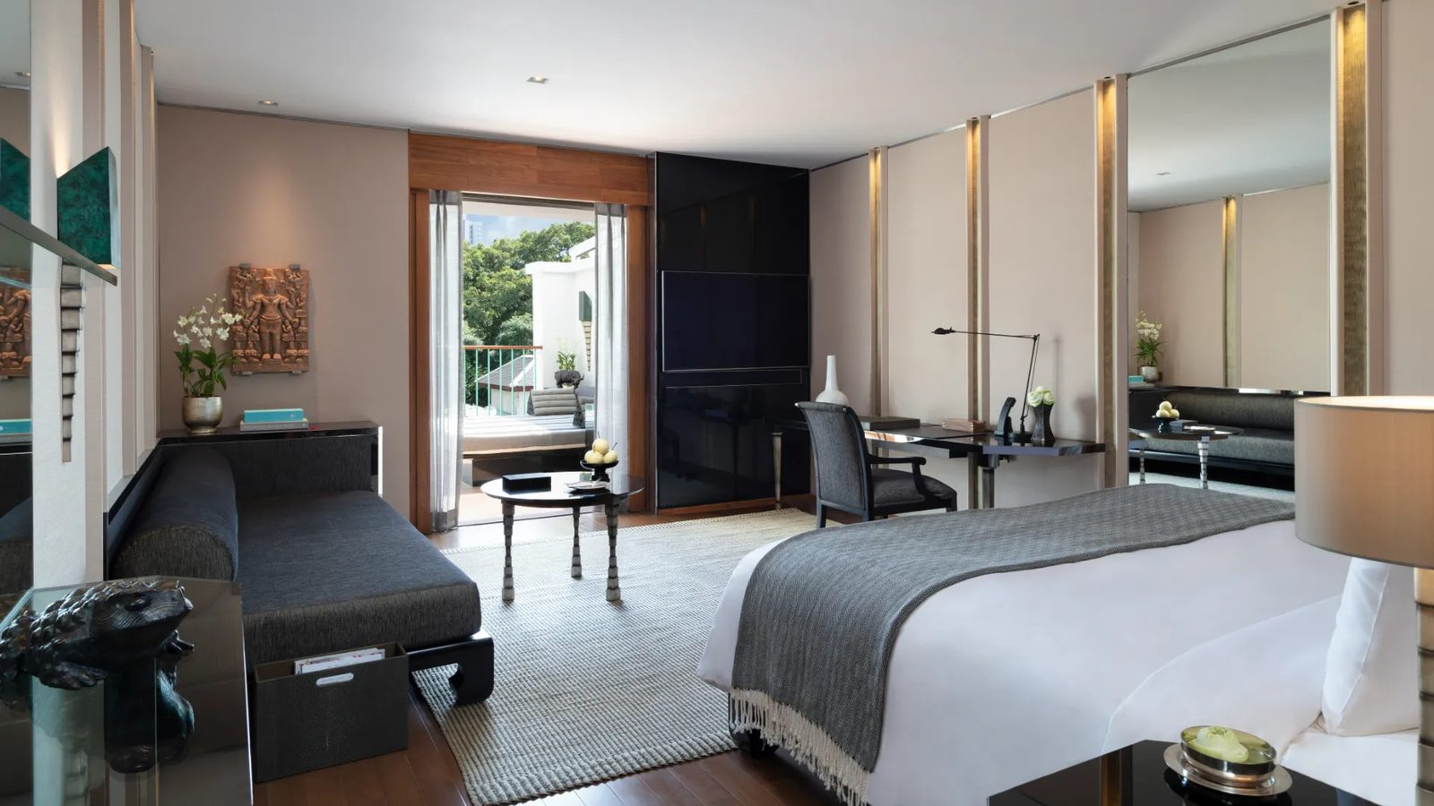 Club Balcony Room at The Sukhothai Bangkok, with its door open to the balcony
