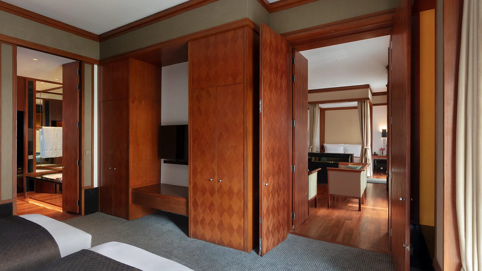 Garden Suite in the Main Wing at The Sukhothai Bangkok, with teak panelling
