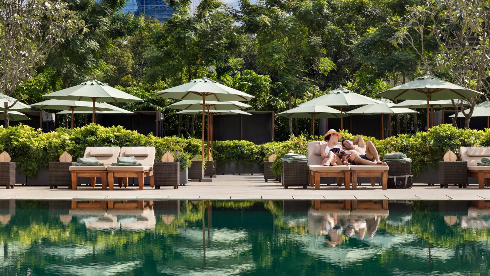 The 25-metre saltwater pool and gardens at The Sukhothai Bangkok on Sathorn Road