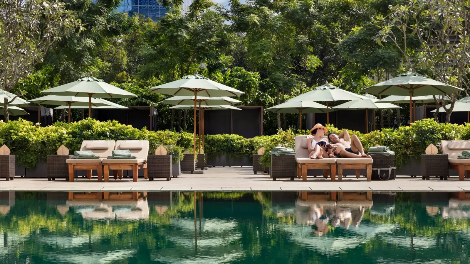 The 25-metre saltwater pool and gardens at The Sukhothai Bangkok on Sathorn Road