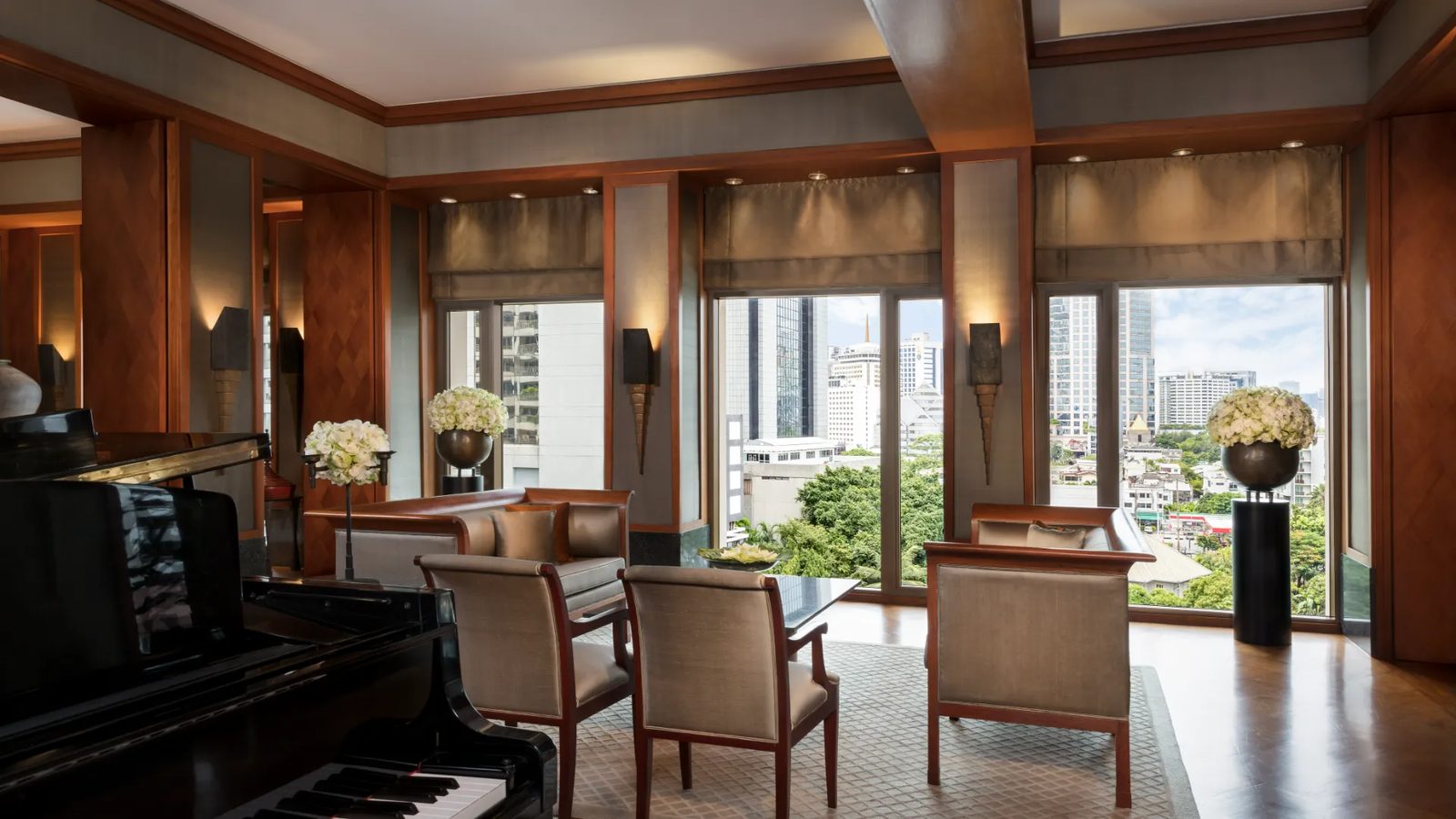 Living room of The Sukhothai Suite with a grand piano, The Sukhothai Bangkok
