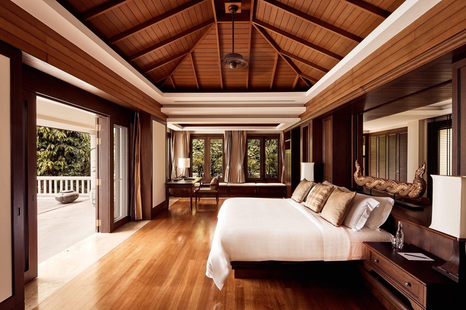 Bedroom with teak ceiling in an Ocean Front Pool Villa at Trisara
