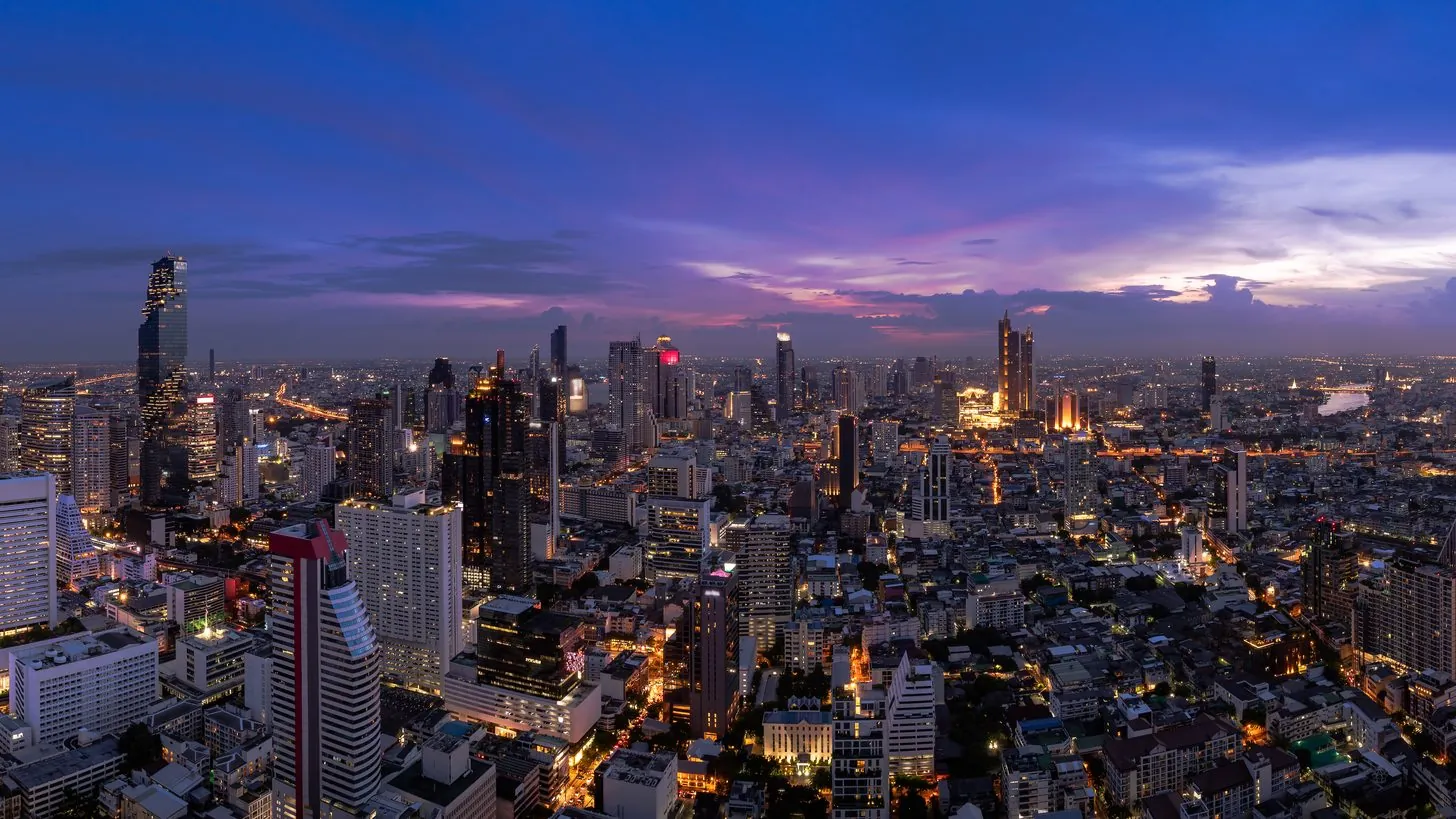 Bangkok business district skyline at twilight — grow with Thailand tourism alongside Explera DMC