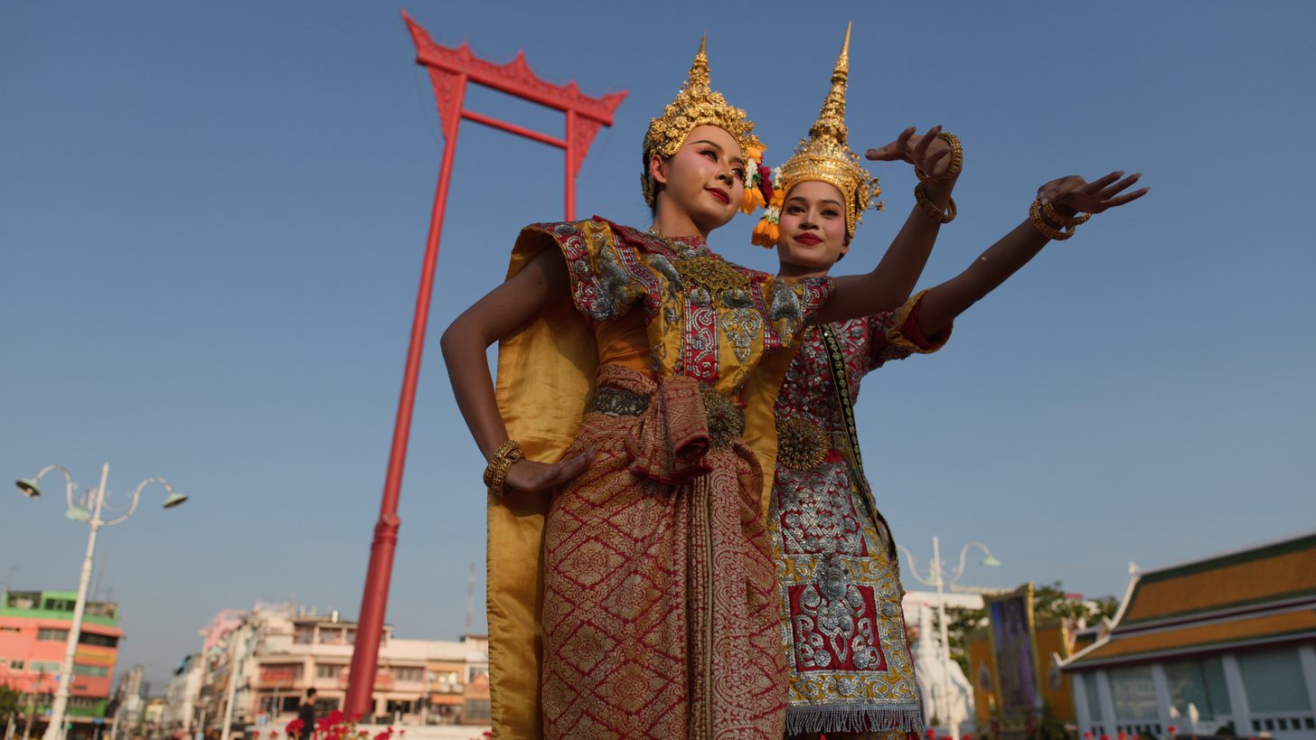 Thai khon dancers performing in traditional costume