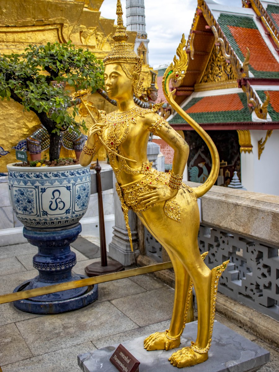 Gilded Thepnorasingha figure at Wat Phra Kaew in the Grand Palace, Bangkok